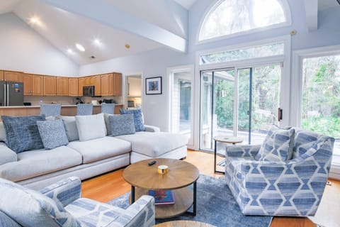 The sliding glass door in the living room leads to the back deck with private pool and hot tub.