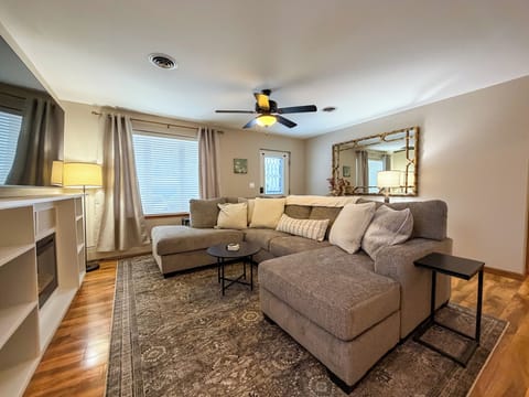 Spacious living room with electric fireplace