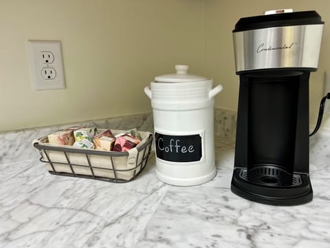 Coffee and tea provided, with cream and sugar