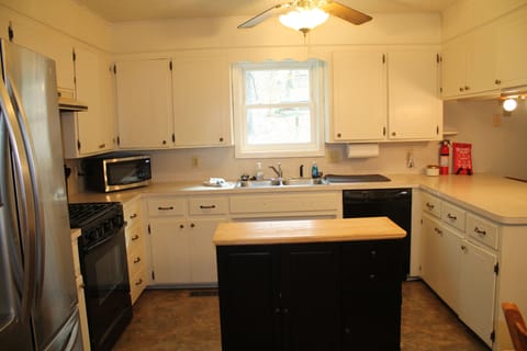 GAS stove/oven, microwave, dishwasher, and frig/freezer