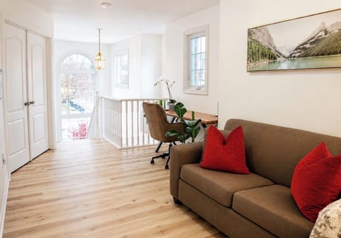 Bright & welcoming upper-level landing 
Soaring foyer windows!