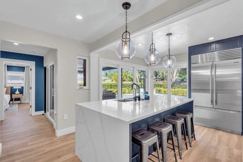 Kitchen Island with Seating for 4 + Dishwasher + Built in Wine Cooler.