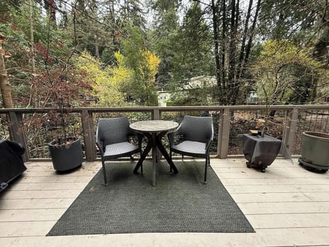 Step outside into your own peaceful backyard deck next to the seasonal creek — perfect for morning coffee or evening lantern lights.