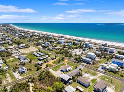 Stunning community with pristine white sand beaches and crystal-clear turquoise waters stretching to the horizon.
