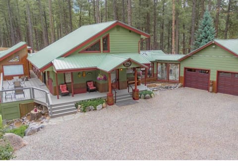 Full house view, one acre lot backs up to private ranch