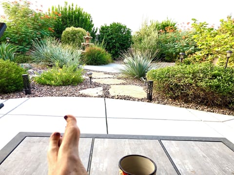 Morning coffee in the large, private backyard. Landscaper comes twice monthly.