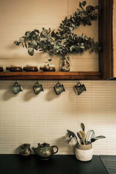 Full kitchen - teapots, utensils and mugs