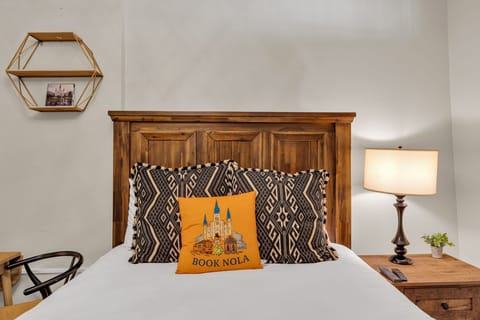 Statement headboard with signature Book NOLA touch