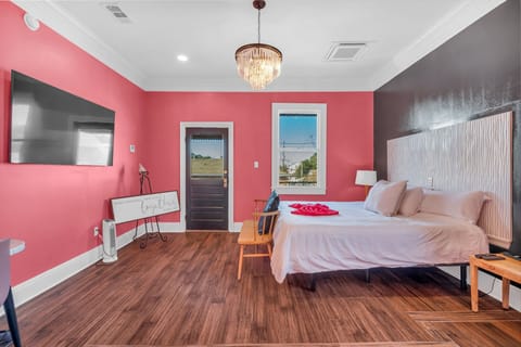 Cozy bedroom with city views and plush bedding