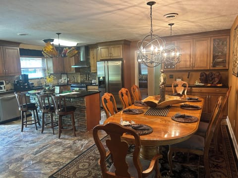 Dining table opens to seat 12 if needed