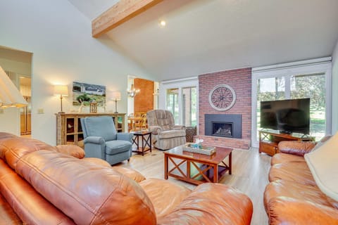 Bright living room with fireplace and comfortable seating