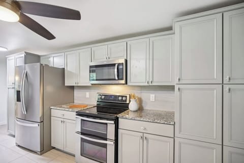 Kitchen with double oven and microwave