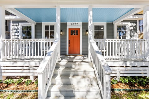 The bright orange door invites you into our newly renovated 1920s home. 