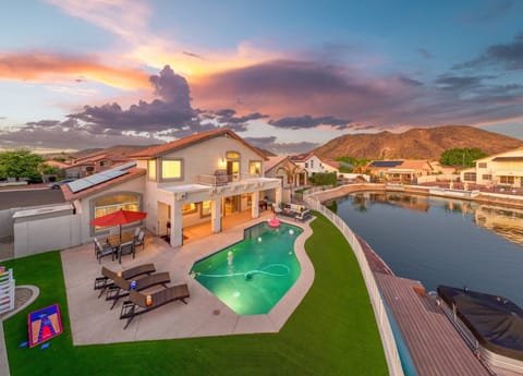 Waterfront property with heated pool.