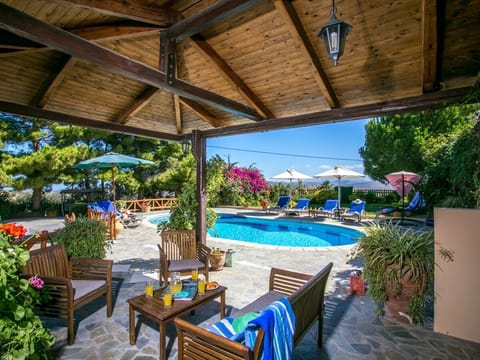 Covered terrace by the pool