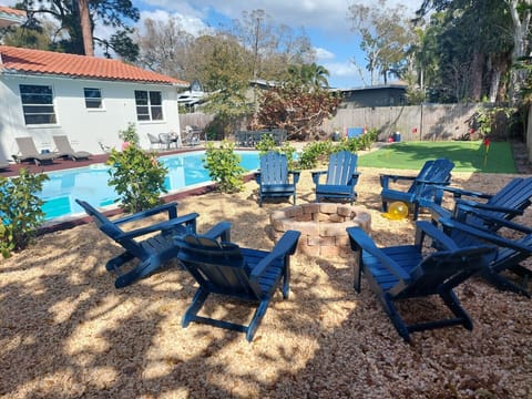 Enjoy our private backyard pool and built-in stone fire pit with premium Adirondack seating for the ultimate evening retreat.