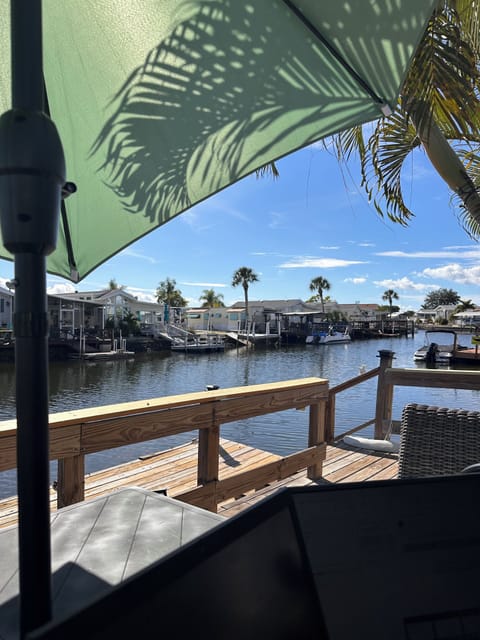 Deck on canal, tie up boat, watch manatee, get sun, dine and unwind