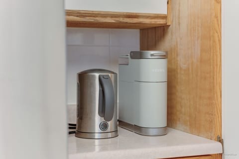 Coffee + tea station with kettle and essentials provided.