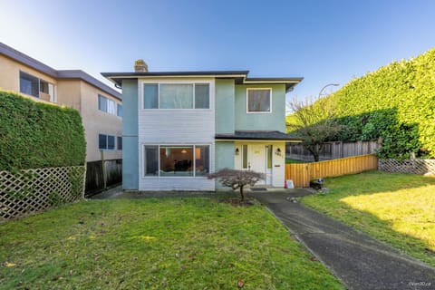 Bright, peaceful home with private lawn, easy walk-up, and lush greenery.