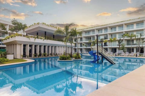 Outdoor pool with slide