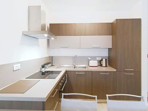 Kitchen, Kitchen Appliance, Countertop, Cabinetry, Furniture, Interior Design, Major Appliance, Flooring, Wood, Floor