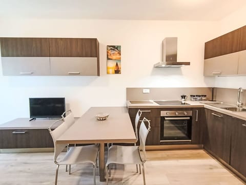 Furniture, Interior Design, Kitchen, Wood, Countertop, Flooring, Cabinetry, Kitchen Appliance, Major Appliance, Room