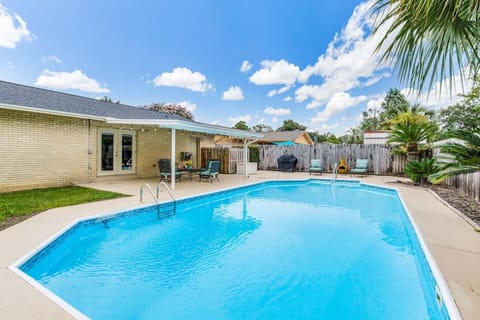 In ground pool, professionally maintained, large deck area around the pool. Plenty of room for sunbathing