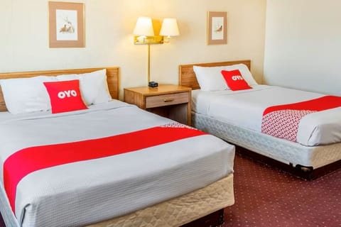 Settle in with roomy comfort, dining table, and easy in-room meals.