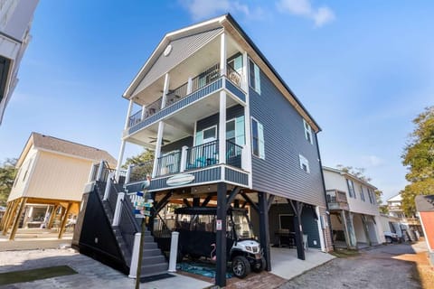 Spacious three-story home with multiple balconies for relaxing views