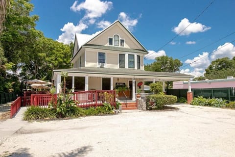 Front and side view of the house and front patio. The left side is the dining patio area.