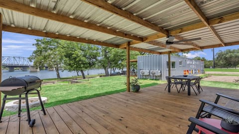 Fire up the grill and enjoy easy outdoor living by the river.