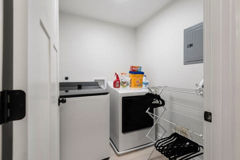 Laundry Room: This dedicated space ensures you can easily refresh your wardrobe during longer stays without ever leaving the comfort of home.