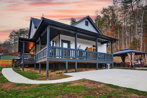 A welcoming mountain home with easy access, ample parking, and outdoor spaces to explore.