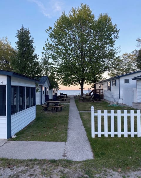 Whole property view. 4 cabins on the left- main house on right. 
