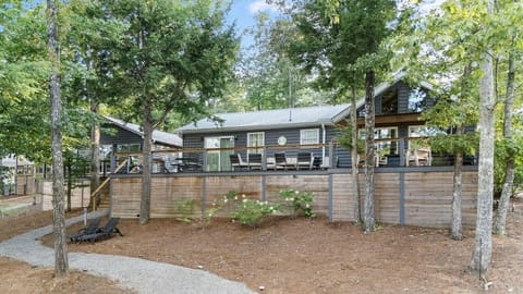 Back porch with lots of outdoor seating, propane flat top grill & fire table 