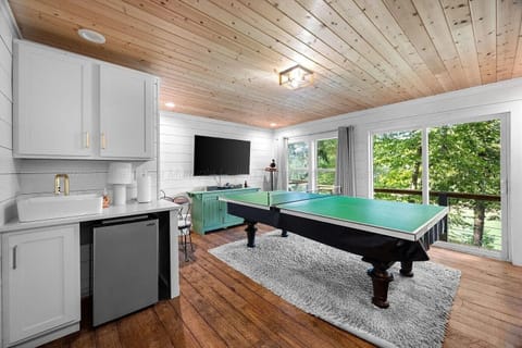 Guest house living space with small kitchen and coffee area