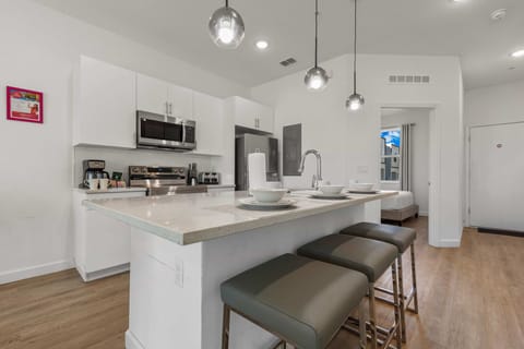 Cook, dine, and connect in a beautifully open modern kitchen