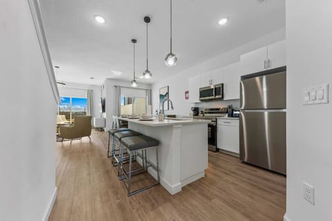 A sleek, open-concept kitchen designed for effortless cooking and gathering