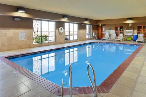 Unwind with refreshing laps in the bright indoor pool.