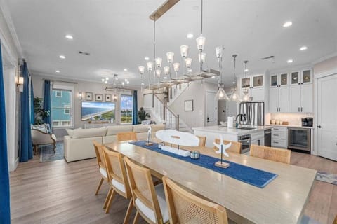 Open dining and kitchen layout ideal for entertaining large groups.