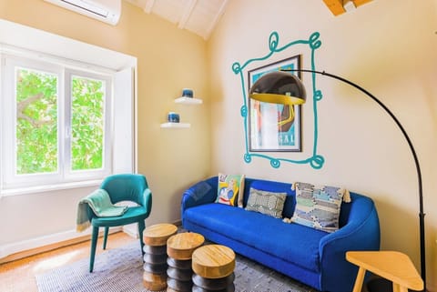 Living Room with TV and Air Conditioning.
