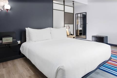 Unwind into crisp linens and sleek, modern design details.