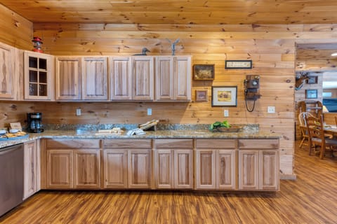 Long galley-style kitchen counter with ample cabinet space.
