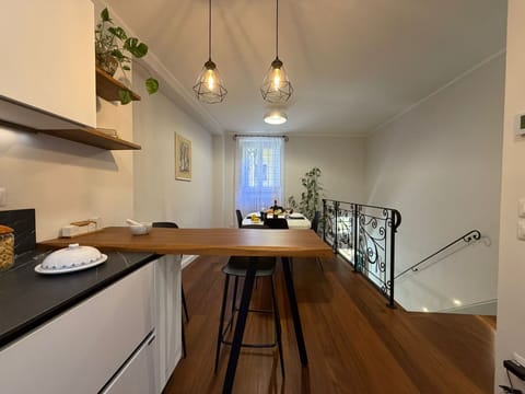 Interior Design, Furniture, Flooring, Wall, Light Fixture, Wood, Countertop, Floor, Ceiling, Wood Flooring