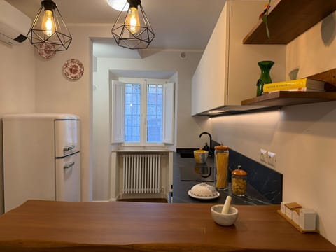 Interior Design, Flooring, Furniture, Wood, Light Fixture, Countertop, Kitchen, Ceiling, Lighting, Kitchen Appliance