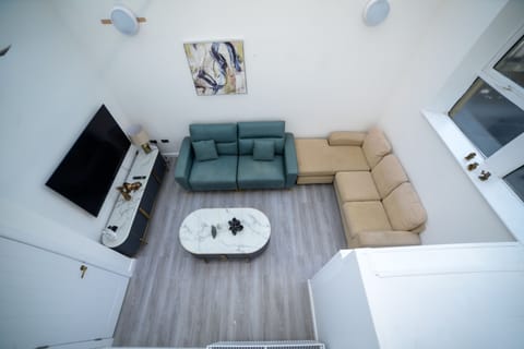 A bright and inviting living space designed for comfort and relaxation.