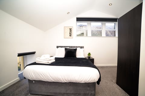Relax and unwind in this cosy double bedroom, designed for a peaceful night’s sleep.