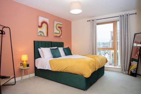 Bedroom 2-This light and relaxing bedroom offers a zip-link king bed that can be set as two singles, with the added convenience of a private bathroom nearby.