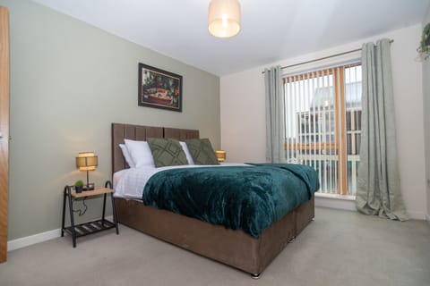 Master Bedroom with En-suite. Comfort meets flexibility in our master bedroom, featuring a zip-link king bed (or twin singles) and a private ensuite.