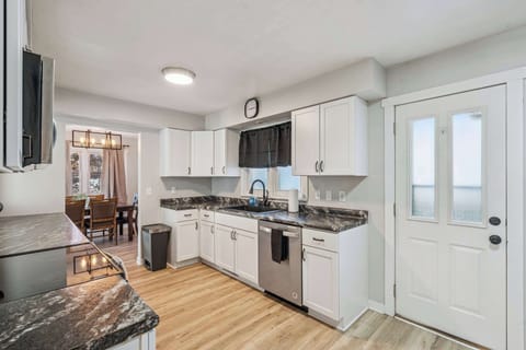 Open layout kitchen with eat in counter/bar space